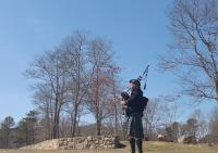 Piping at a funeral at the National Cemetery in Bourne, MA.